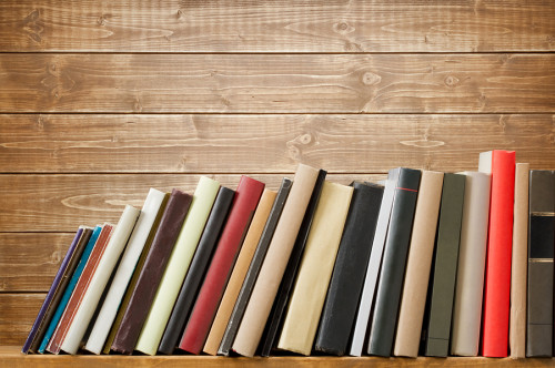 bigstock-Old-books-on-a-wooden-shelf-N-46537213